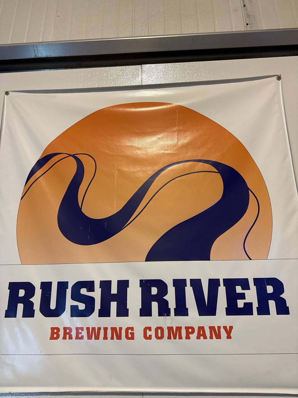 Rush River Brewing Company hand-painted banner